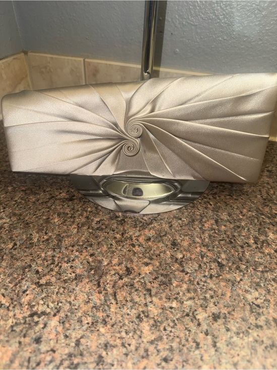 Christian Louboutin Handbags - Christian Louboutin 💎Silver Satin Swirl Clutch